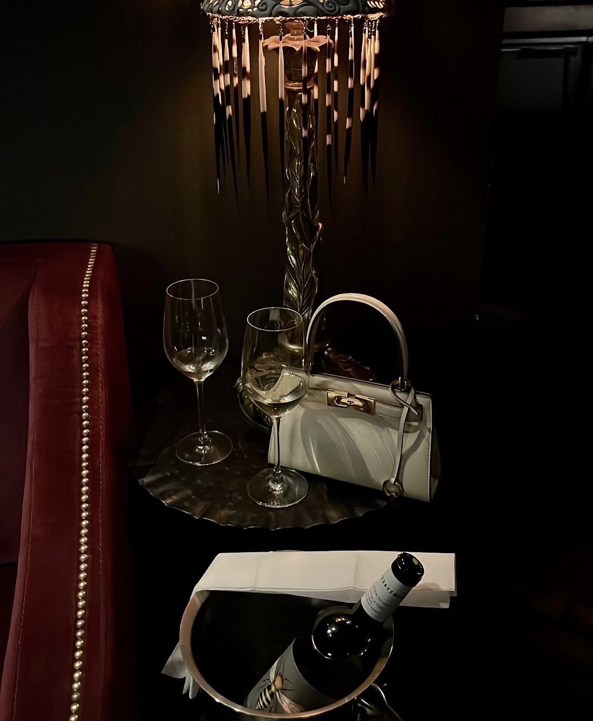 Evening still life with handbag and wine